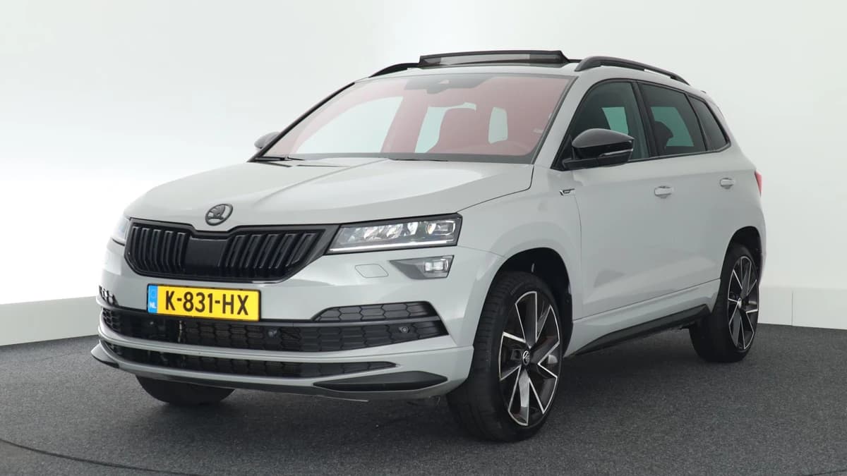 Škoda Karoq 1.5 TSI 150pk DSG ACT Sportline Business Trekhaak Camera Canton Keyless Virtual Cockpit Stoelverwarming Navigatie — foto 1