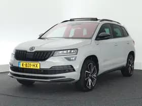 Škoda Karoq 1.5 TSI 150pk DSG ACT Sportline Business Trekhaak Camera Canton Keyless Virtual Cockpit Stoelverwarming Navigatie