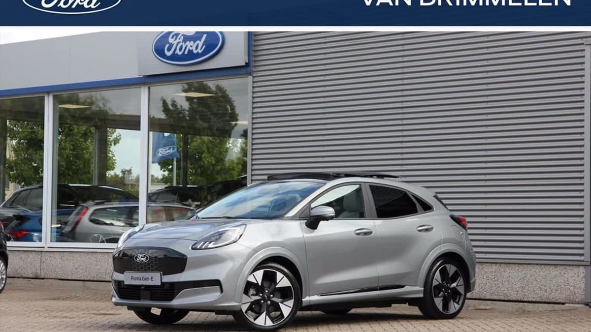 Ford Puma Gen-E Premium 0,99% rente! € 3.000 voordeel! Kom proefrijden! Solar Silver — foto 1