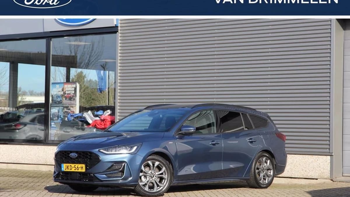 Ford Focus Wagon Hybrid 125pk ST-Line | Adaptive Cruise | Winter Pack | Rijklaarprijs! Chrome Blue Metallic — foto 1