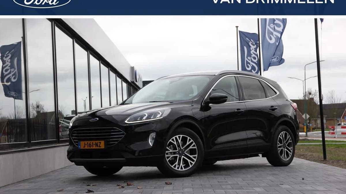 Ford Kuga 2.5 PHEV e-CVT 225pk Titanium X 'Agate Black' | NL Auto | Dealer onderhouden Agate Black Metallic — foto 1