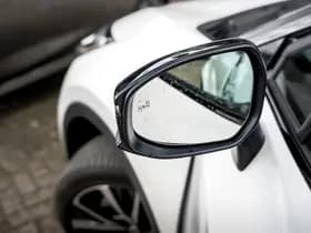 Toyota C-HR 1.8 Full Hybrid First Edition | Bi-Tone | Apple carplay | Stoel en Stuurverwarming | PDC | Navigatie | Adaptieve cruise | Achter thumbnail 21