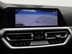 BMW 3-serie serie 320e m sport pano camera memory stoelverwarming trekhaak thumbnail 15