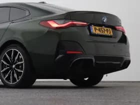 BMW I4 m50 high executive m sport 84 kwh 360 adaptive hud memory stoelverwarming thumbnail 21