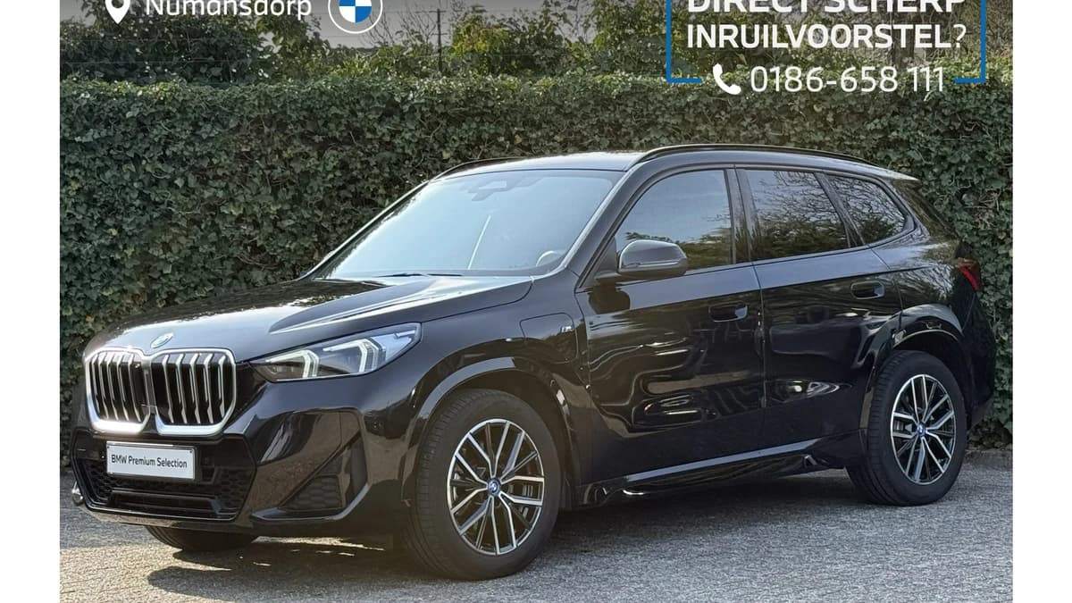 BMW X1 xDrive25e | M-Sport | Camera | Stoel + stuurverw. | Harman/kardon — foto 1