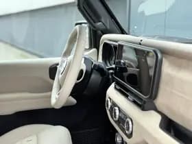 Jeep Wrangler Unlimited 4xe 380 Sahara | BRUTE Active Suspension System | Individual Kleur | Apple-Android thumbnail 2