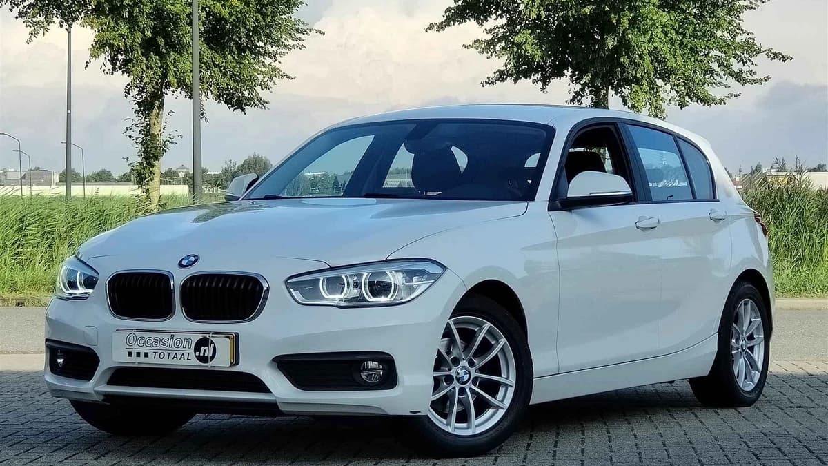 BMW 1 Serie 116i Executive | Led | Trekhaak | Navi | Climate — foto 1