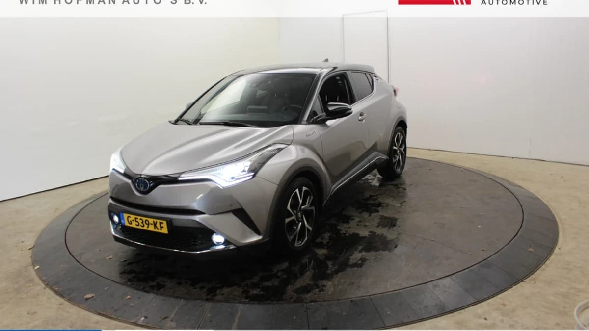 Toyota C-HR 1.8 Hybr Bi-Tone Plus APK 03-2027 VolLeder JBL Sound Camera Stoel Ver Dhoek Detectie — foto 1