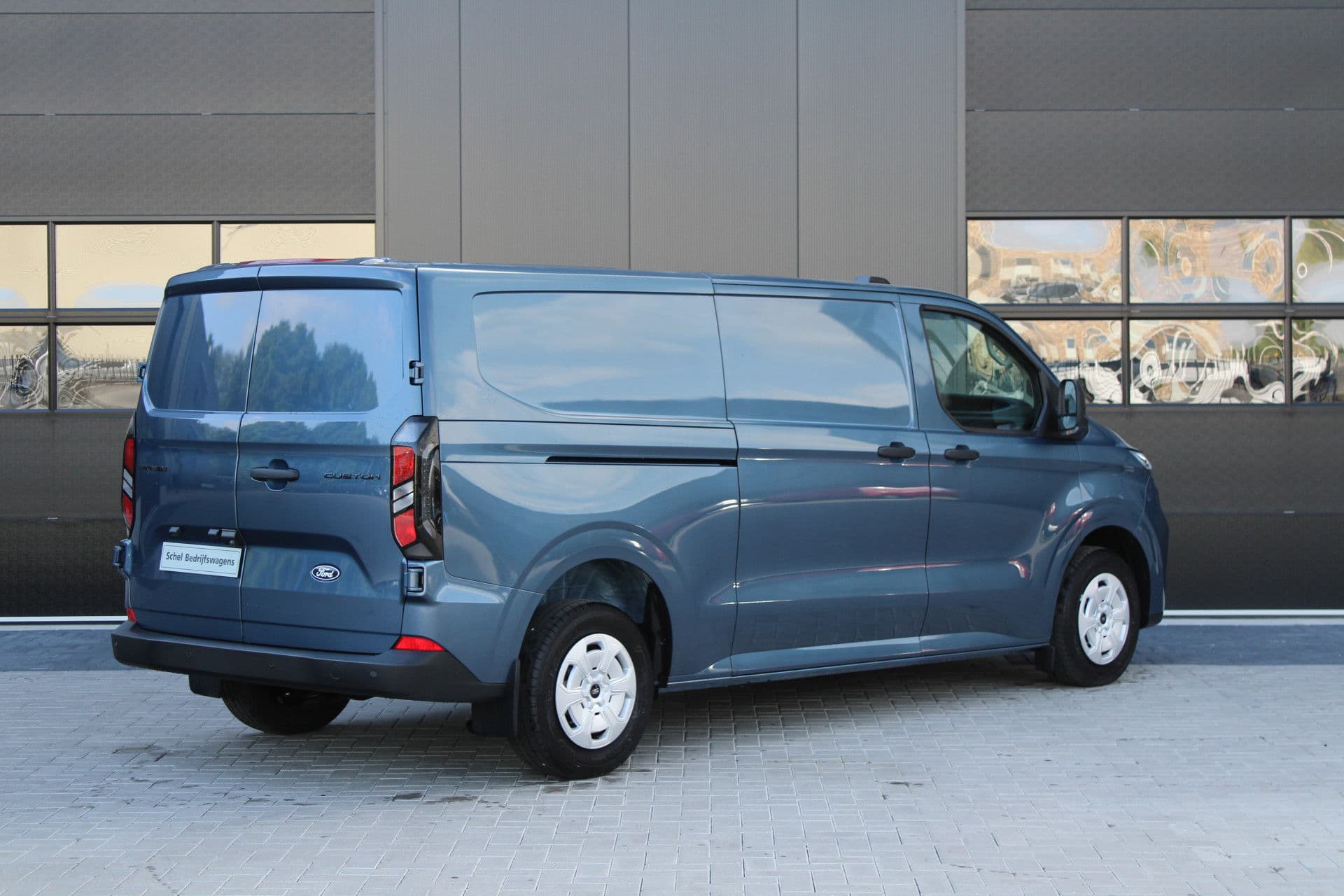 Ford Transit Custom 320 2.0 TDCI L2H1 Trend 136pk - 2x Schuifdeur - Carplay - Android - Camera - Trekhaak - Stoelverwarming -70l tank - Rijklaar thumbnail 7