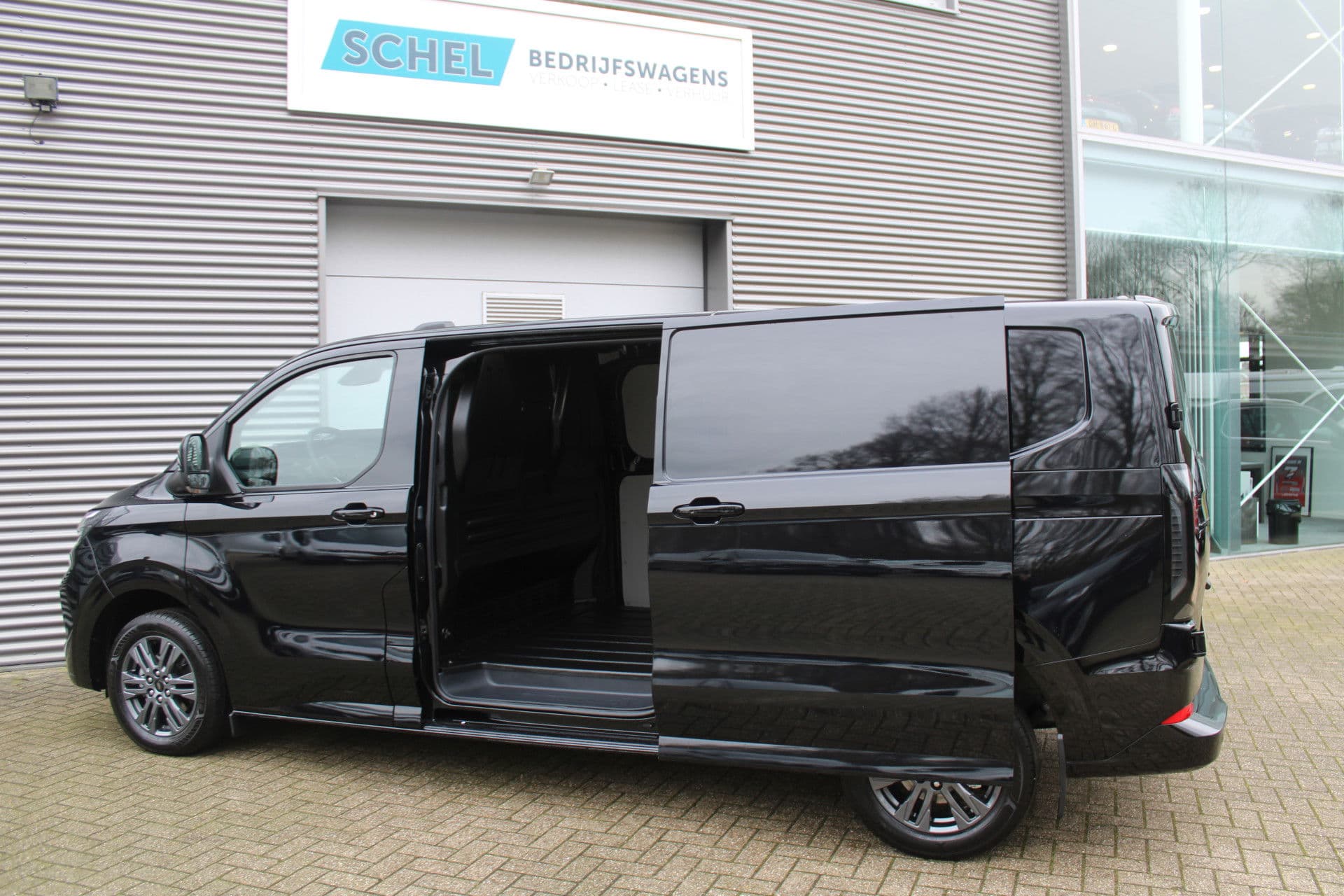Ford Transit Custom 320 2.0 TDCI L2H1 Limited 170pk - 1+1 Stoelopstelling - 2x Schuifdeur - Adaptive Cruise - Verwarmd stuur - Blind spot - Navigatie - Camera - Draadloos laden - Rijklaar thumbnail 9