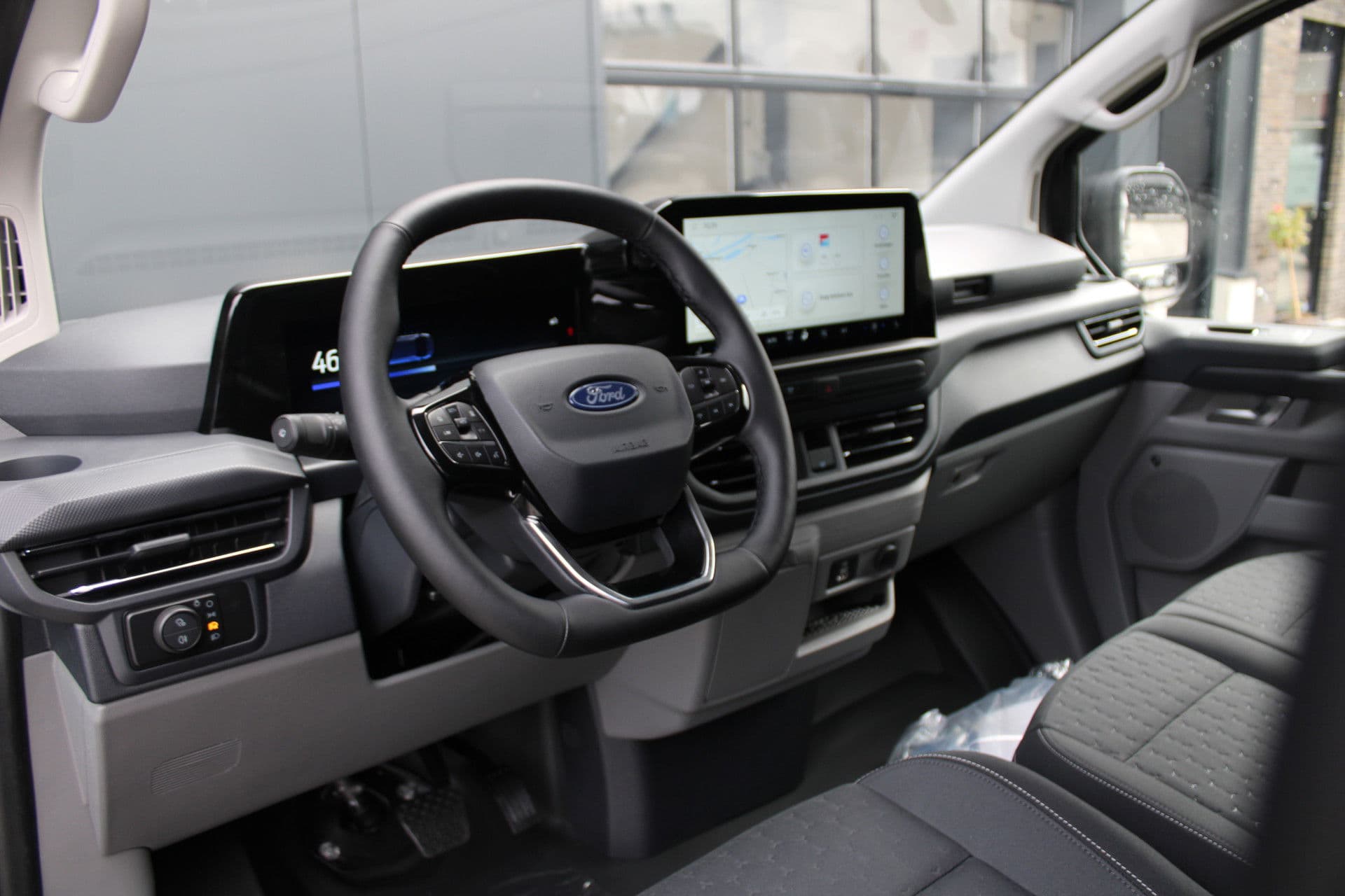 Ford E-Transit Custom 340 L2H1 Limited 65 kWh 218pk - DIRECT LEVERBAAR - 2x Schuif - LED - 360 Camera - B&O - ACC - Navi - Stoel/Stuurverwarming - Rijklaar thumbnail 2