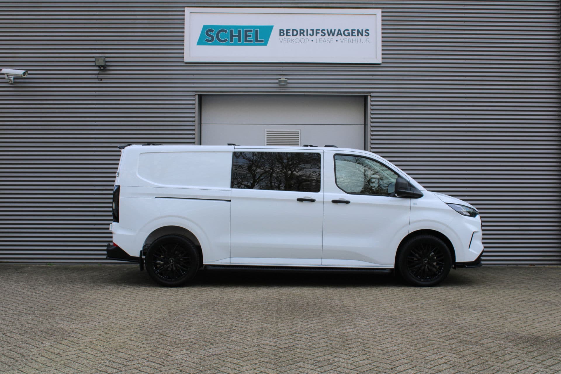 Ford Transit Custom 320 2.0 TDCI L2H1 Trend DC 136pk - Raptor Grill - Styling Pack - LM velgen - Betimmering - Camera - Trekhaak - LED koplampen - Rijklaar thumbnail 6