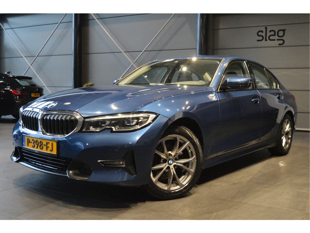 BMW 3 Serie 318i Edition navi clima cruise led pdc trekhaak 157 pk !!