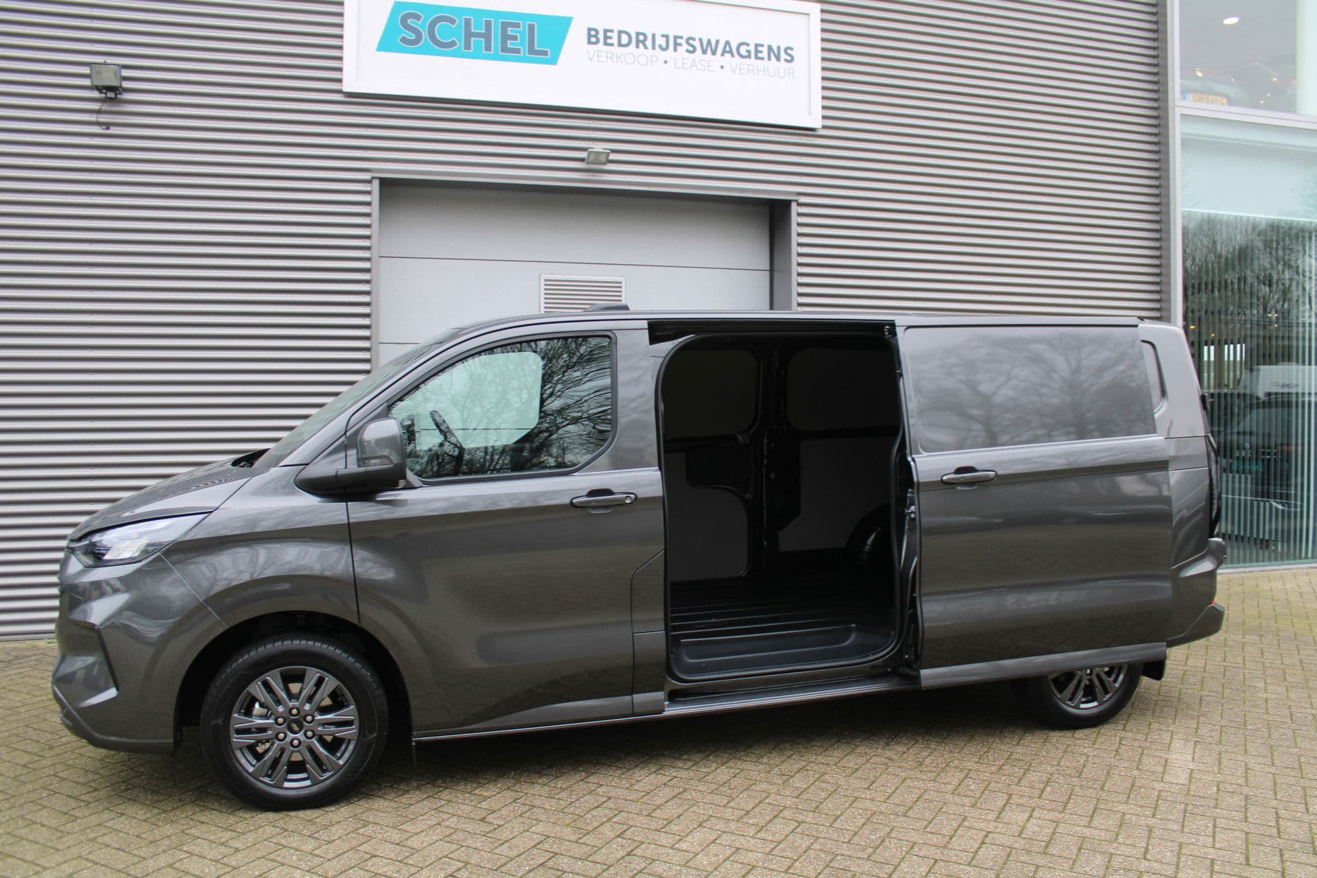 Ford Transit Custom 320 2.0 TDCI L2H1 Limited 170pk - 1+1 Stoelopstelling - 2x Schuifdeur - Adaptive Cruise - Verwarmd stuur - Blind spot - Navigatie - Camera - Draadloos laden - Rijklaar thumbnail 14