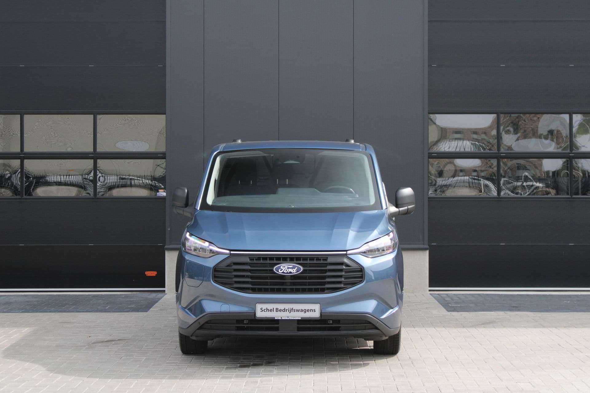 Ford Transit Custom 320 2.5 PHEV L2H1 Trend 232pk - 5 jaar GARANTIE - 2x Schuifdeur - Adaptive Cruise - Blind Spot - Navigatie - Camera - Verwarmd Stuur - Rijklaar thumbnail 2