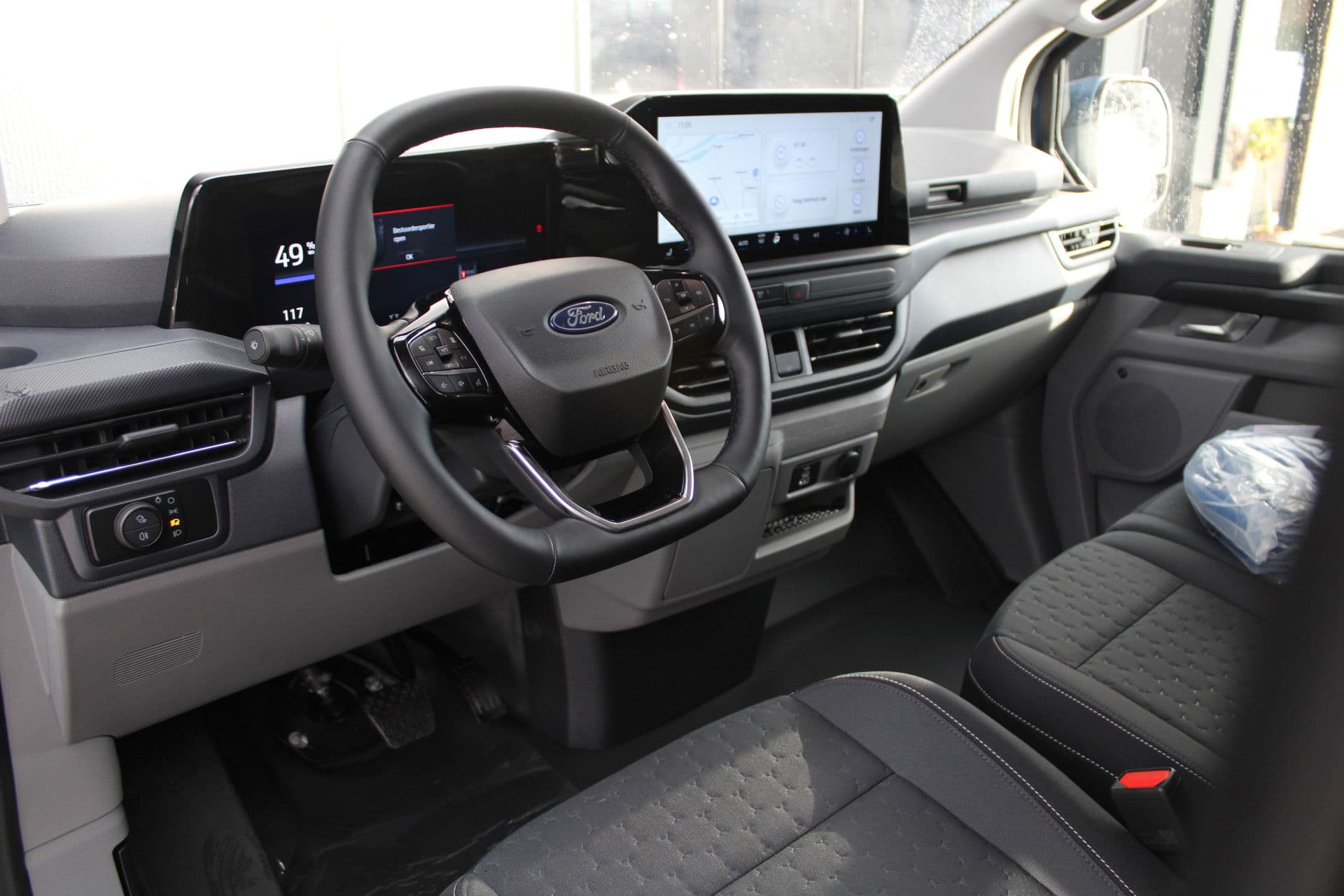 Ford E-Transit Custom 340 L2H1 Limited 65 kWh 218pk - 2x Schuif - LED - 360 Camera - B&O - ACC - Navi - Stoel/Stuurverwarming - Rijklaar thumbnail 2