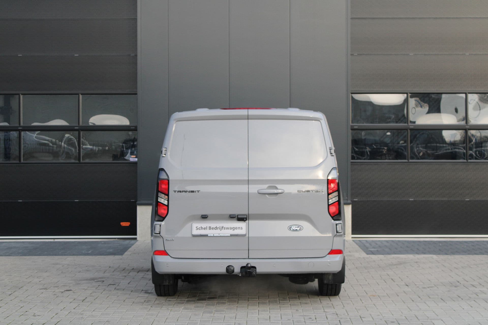 Ford Transit Custom 320 2.5 PHEV L2H1 Limited 232pk - 2x Schuifdeur - Trekhaak - Stoel/Stuurverwarming - ACC - Blindspot - Keyless - Rijklaar thumbnail 7