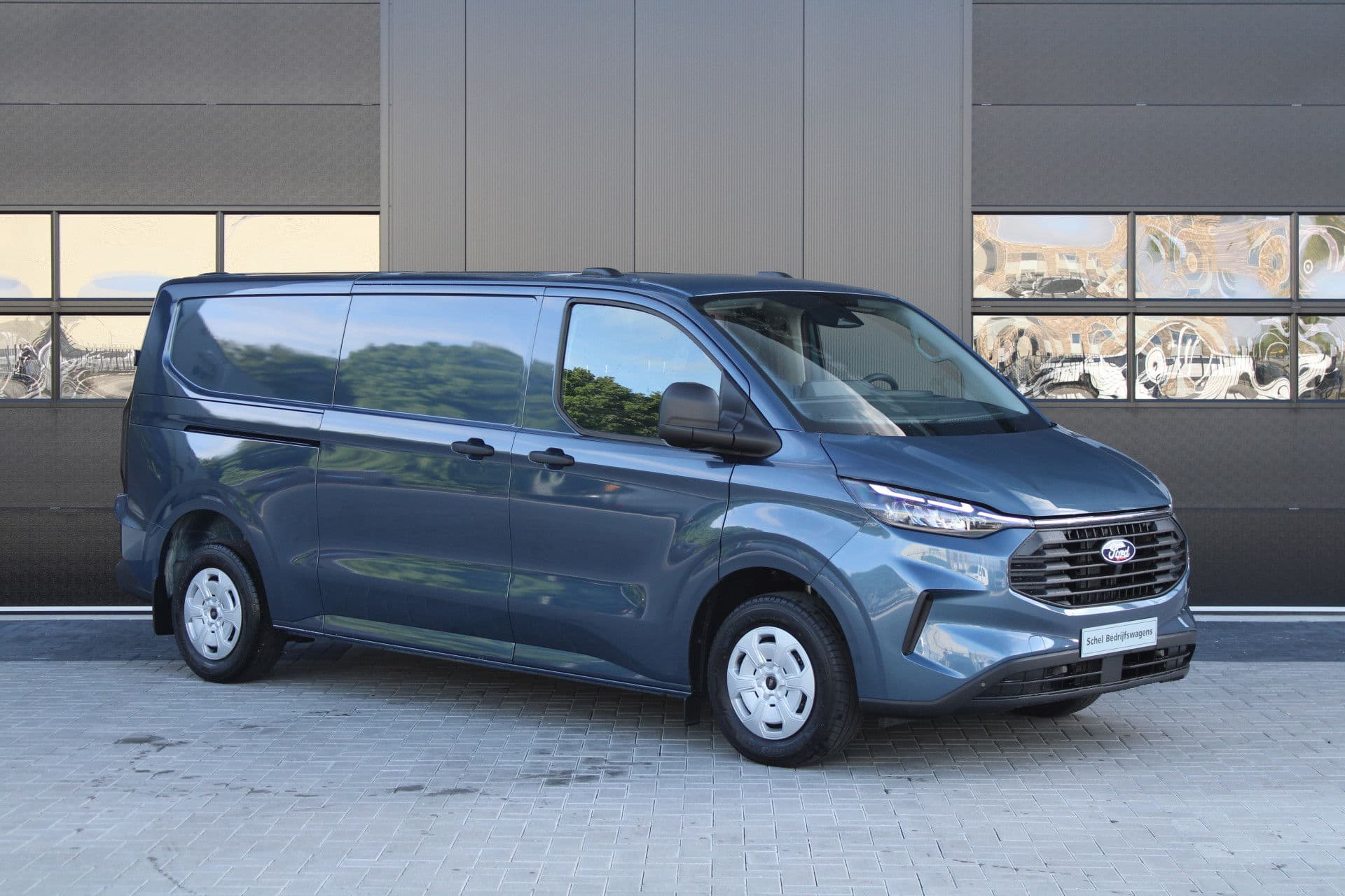 Ford Transit Custom 320 2.0 TDCI L2H1 Trend 136pk - 2x Schuifdeur - Carplay - Android - Camera - Trekhaak - Stoelverwarming -70l tank - Rijklaar thumbnail 4