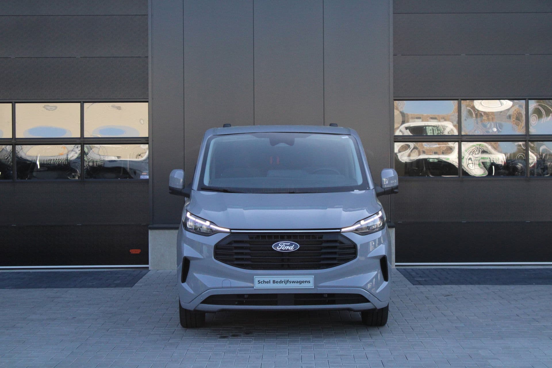 Ford Transit Custom 320 2.0 TDCI L2H1 Limited 170pk - 1+1 Stoelopstelling - 2x Schuifdeur - Adaptive Cruise - Verwarmd stuur - Blind spot - Navigatie - Camera - Draadloos laden - Rijklaar thumbnail 2