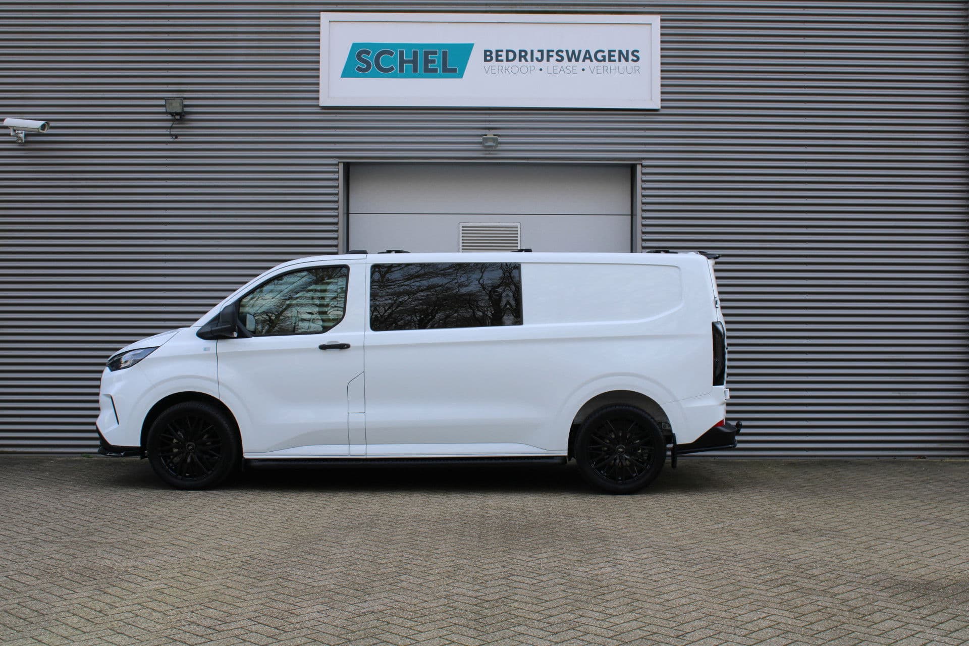 Ford Transit Custom 320 2.0 TDCI L2H1 Trend DC 136pk - Raptor Grill - Styling Pack - LM velgen - Betimmering - Camera - Trekhaak - LED koplampen - Rijklaar thumbnail 11