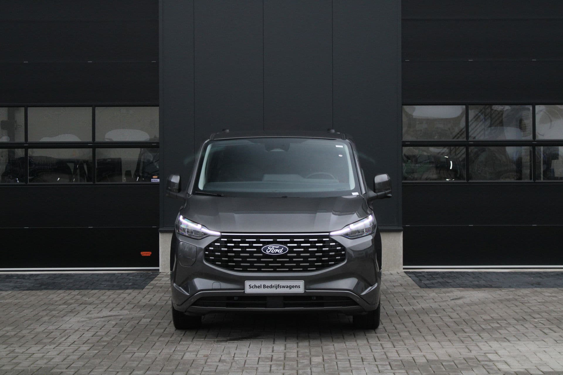 Ford Tourneo Custom 340 2.5 PHEV L2H1 Titanium X 232pk - 2x Schuif - ACC - 360 camera - Leder - Prijs excl. BTW - Rijklaar thumbnail 2