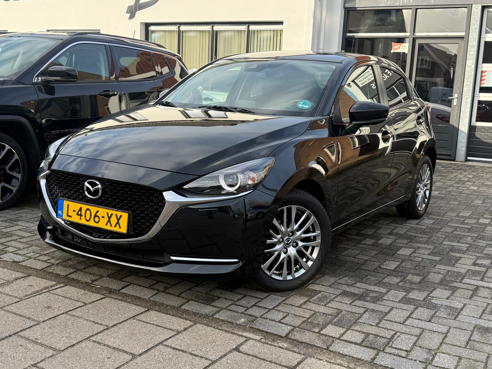 Mazda 2 1.5 Skyactiv-G Luxury,Apple Carplay/Android Stoelverwarming,Stuurverwarming,Navigatie,Achteruitrij camera