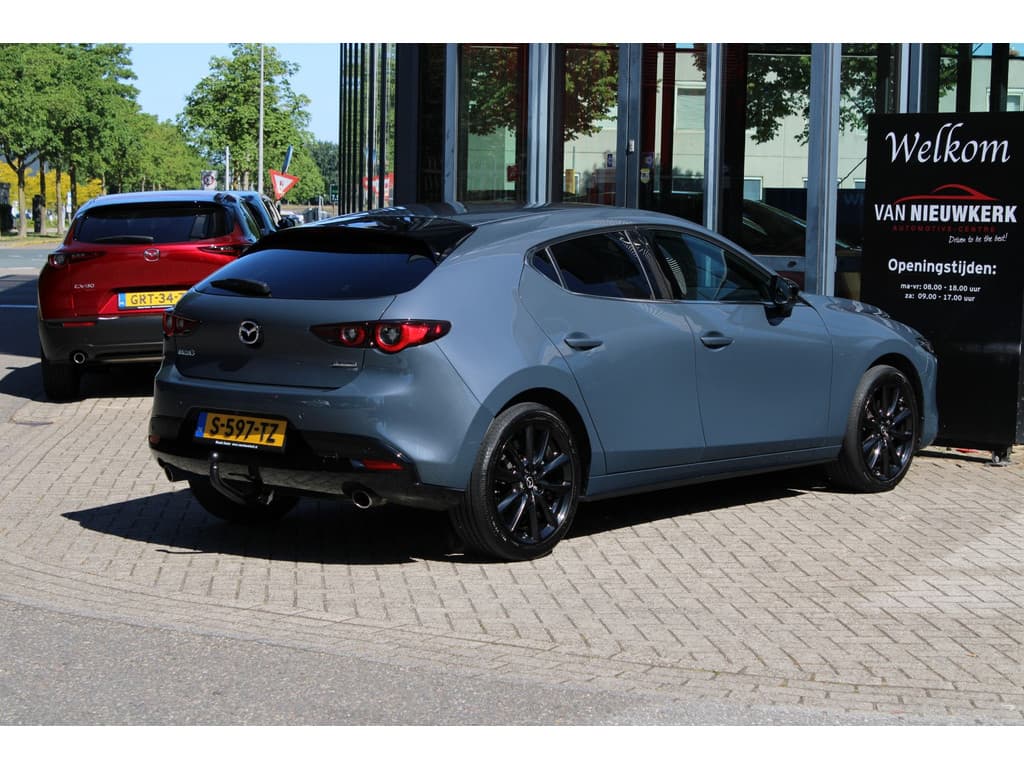 Mazda 3 Hatchback e-Skyactiv-G 150pk M Hybrid Automaat Homura Trekhaak Dealer Onderhouden thumbnail 2